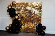 Gold mirror sequin wall