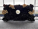 Handmade luxury black cloth back feather wall backdrop for weddings and events by Supply My Events