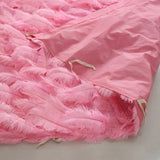 Handmade luxury pink cloth back feather wall backdrop for weddings and events by Supply My Events