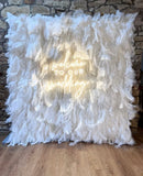 Handmade luxury white cloth back feather wall backdrop for weddings and events by Supply My Events
